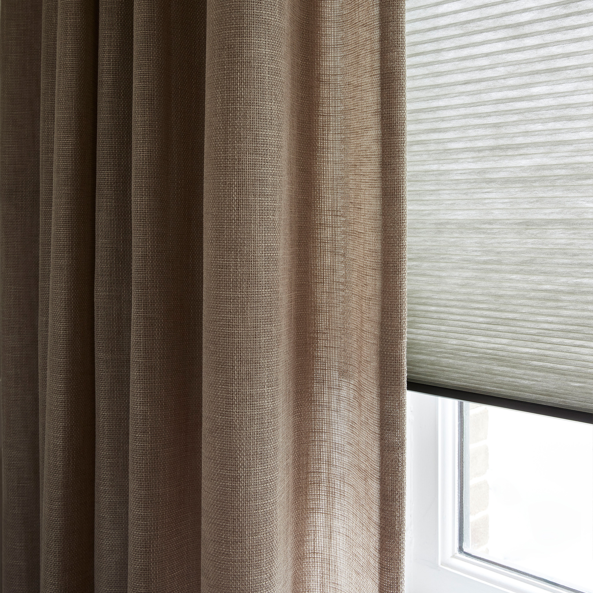 Vloerverwarming in huis? Vergeet je raamdecoratie niet